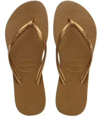 Havaianas Slim Sandal - Bronze  Own the beach this summer in the iconic Slim flip flop. Featuring a slim sole and straps, this feminine style keeps feet cool and comfortable from sun soaked days to breezy summer nights.  Material: 100% High Quality, super-soft yet durable rubber