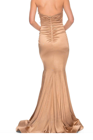 Beige strapless gown on a white background