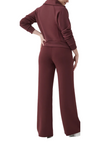 Air Essentials Wide Leg Pants Spice is made with spacer fabric that’s lightweight, luxuriously soft and ultra drapey. Designed with refined comfort to feel silky against your skin, these ultimate throw-on-and-go styles will take you anywhere and everywhere.  Bak View. 47% Modal 46% Polyester 7% Elastane 