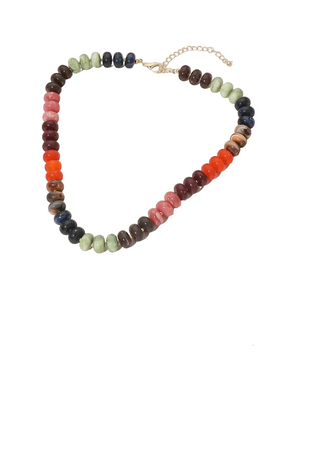 A beaded necklace made of irregular stone beads in multiple colors, including dark blue, green, brown, orange, and pink, arranged in a heart shape on a light beige background.