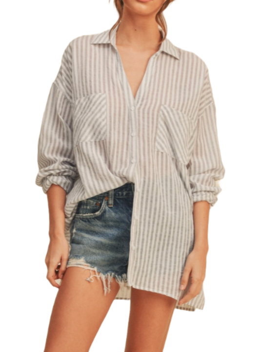 Breezy Days Button Down Shirt  A comfy and breezy tan and white striped button-down shirt. It's got a relaxed vibe with long sleeves and a couple of handy front pockets. Perfect for laid-back days and effortlessly stylish outings  Material:  100% Cotton