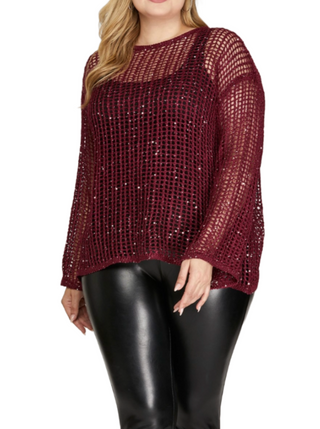 Cabernet Mesh Elegance Top  This long sleeve fish-net sweater top is a trendy and daring fashion statement. Its alluring design combines a classic silhouette with an edgy twist, featuring intricate fish-net detailing and shimmering sequins that add a touch of glamour. Perfect for adding a bold and stylish touch to your outfit.  100%Polyester