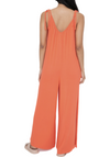 Coquina Coral Jumpsuit  This soft and drapey lounge jumper features an oversized loose fit for maximum comfort. the drop crotch design makes this piece super stylish while the adjustable straps tie at the shoulder creating the ideal fit. It's great for wearing around the house or layering over a tee or bralette.  95% viscose 5% spandex (back)