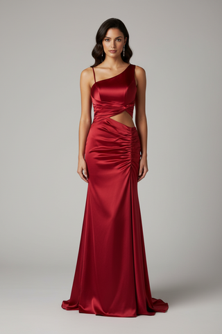 red formal dress on a model with ruching and a cut out in the front