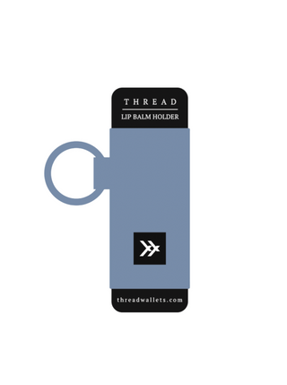 Dusty Blue Lip Balm Holder  You asked, we answered! Introducing the Thread Wallets Lip Balm Holder, the perfect companion to your keychain.  • Signature tight-knit elastic  • Attach to keys with keyring  • Slim profile