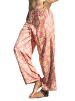 Duvin Tropical Oasis Pants  Relaxed Fitting Cabana Beach Pants  Model Measurements : Height 5'10'', Waist 25'', Bust 33'', Hips 35'' Model Sizing : Wearing Size Small Pant Wide-leg cropped style Adjustable drawstring Single back pocket Beach and leisure pant Elastic Waistband Side Hem Woven Label Back Pocket Drawstring