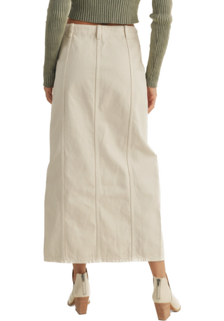 A beige long denim skirt with a front slit is a versatile and stylish wardrobe piece that seamlessly blends casual comfort with a touch of elegance, a timeless addition to your wardrobe that combines comfort, style, and versatility. Whether you're going for a laid-back daytime look or a chic evening outfit, this skirt is a fashion-forward choice that can easily become a staple in your clothing collection.(back)