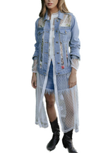 Evermore Floral Denim Jacket features an embroidered floral design on a denim cut out jacket.  100% Cotton   