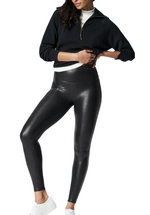 Faux Leather legging Black that flatters. This style features sleek, smoothing faux leather fabric that shapes and lifts and our contoured Power Waistband for core compression.  87% Nylon 13% Elastane