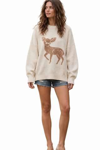 a woman wearing an oatmeal color Fawn Sweater