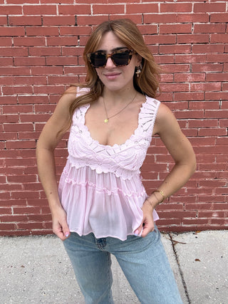 woman in this pink Free People Petal Party Shapeless Cami