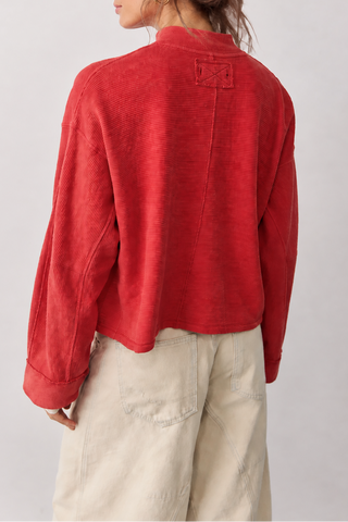 a woman wearing Free People We The Free Celeste Quarter Zip - Salsa