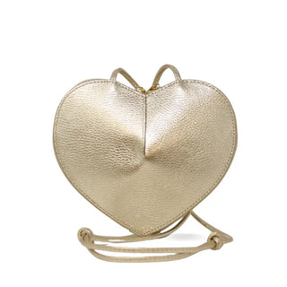 Gold heart-shaped handbag on a white background
