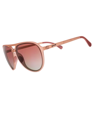 A pair of aviator-style sunglasses with a rose gold metal frame and gradient pink lenses, shown on a white background with a thin gray border.
