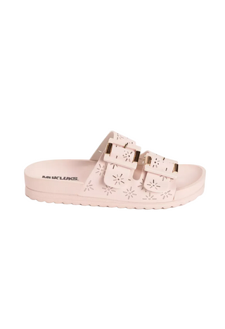blush sandal with floral cutouts on a white background