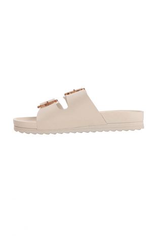Muk Luks sandal displayed on a website with brand logo and product images.
