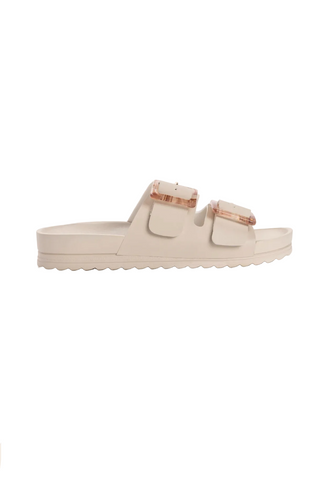 Muk Luks sandal displayed on a website with brand logo at the top.