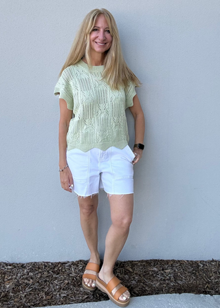 woman in Green Short-Sleeved Cable Knit