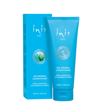 Blue 'inis hair' sea mineral conditioner with packaging on a white background