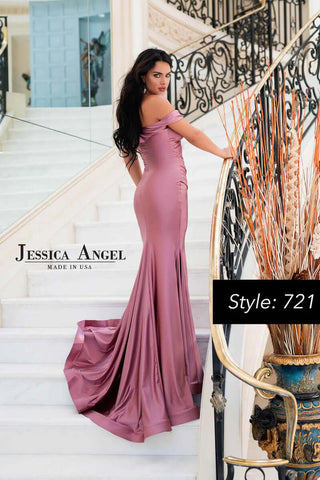 Woman in a pink evening gown standing on a staircase with 'Jessica Angel' branding.