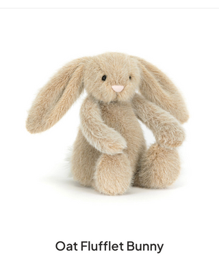 Stuffed bunny toy labeled 'Oat Flufflet Bunny' on a white background