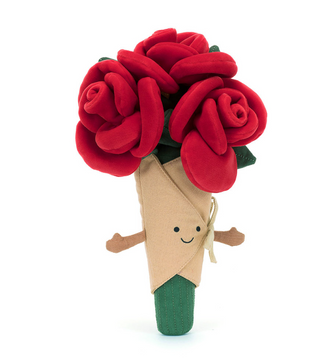 Toy rose with a smiling face on a white background