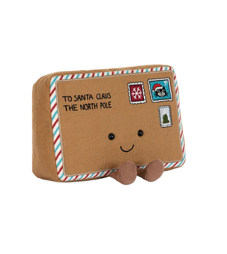 Plush toy resembling a letter to Santa Claus with a smiley face on a white background.