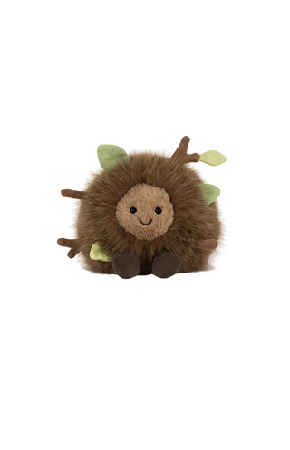 Fuzzy brown round plushie resembling the forrest floor.