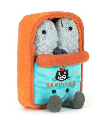 Plush toy with two small gray plush animals inside an orange and blue container labeled 'Sardinas'.