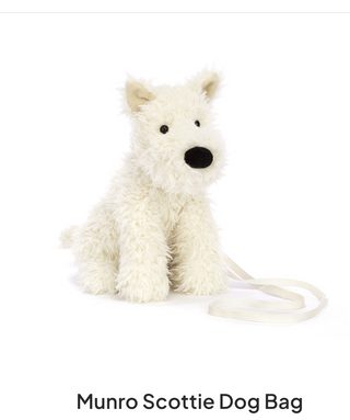 White dog-shaped bag with a shoulder strap on a white background