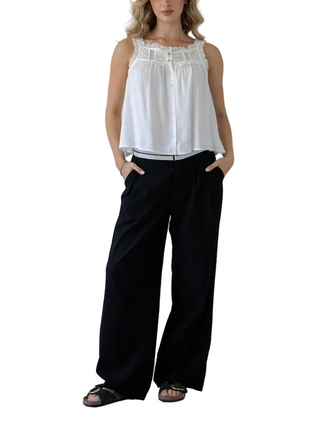 a woman wearing  Lace Trim Flowy Tank Top