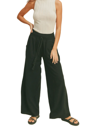 Linen Smocked Waist Pants Black  Rayon linen smocked waist pants with tassel  • 70% Rayon 30% Linen