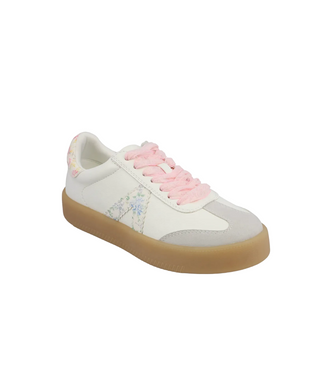 White sneaker with pink laces on a white background