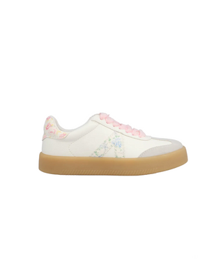 White sneaker with floral design on a white background