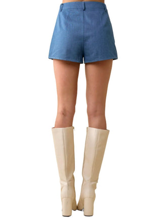 Rhinestone Rider Denim Shorts  Denim shorts with finished hem and rhinestone detail.  Front pockets.  Material: 100% Cotton Back
