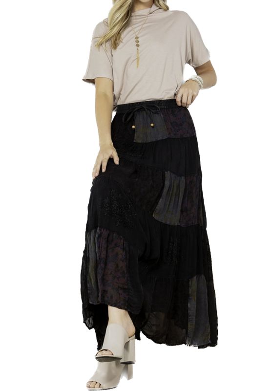 New York Charcoal Tiered Skirt  Crafted with meticulous attention to detail, this A-line skirt features multiple tiers of mixed rayon embroidery patchwork panels and rayon crepe fabric. The combination of different textures and patterns adds depth and visual interest, creating a captivating and dynamic look. Material: Viscose Georgette Printed & Plain Patch