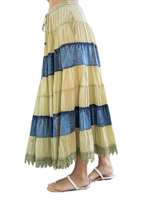 Olive Branch Tiered Midi Skirt Long tiered skirt, fully lined, with side pockets. Mixed and matched in denim and voile for a 60s vibe.   Material:  Denim and Cotton side view