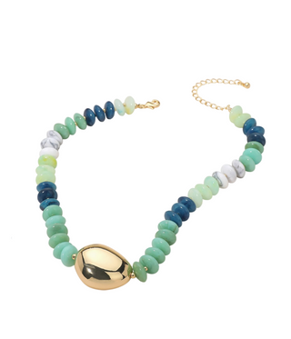 Necklace with multicolored beads and a gold pendant on a white background