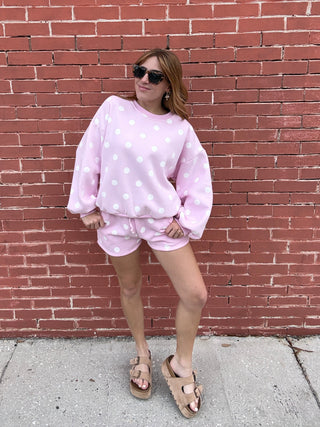 woman in Pink Polka Dot Sweat Shorts