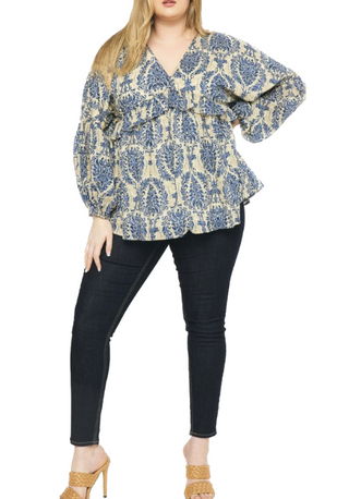 Polly Printed Blouse features a baby doll long sleeve style with a ruffle detail.  100% Cotton
