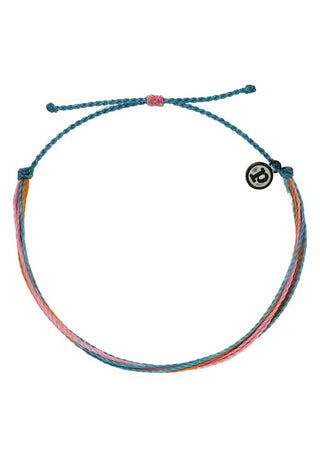Pura Vida Anklet in Tropic  Slightly larger than our original bracelets, your ankle can now be as stylish as your wrist! Every anklet is 100% waterproof. Go surf, snowboard, or even take a shower with them on. Wearing your anklets every day only enhances the natural look and feel. Every anklet is unique and hand-made therefore a slight variation in color combination may occur.