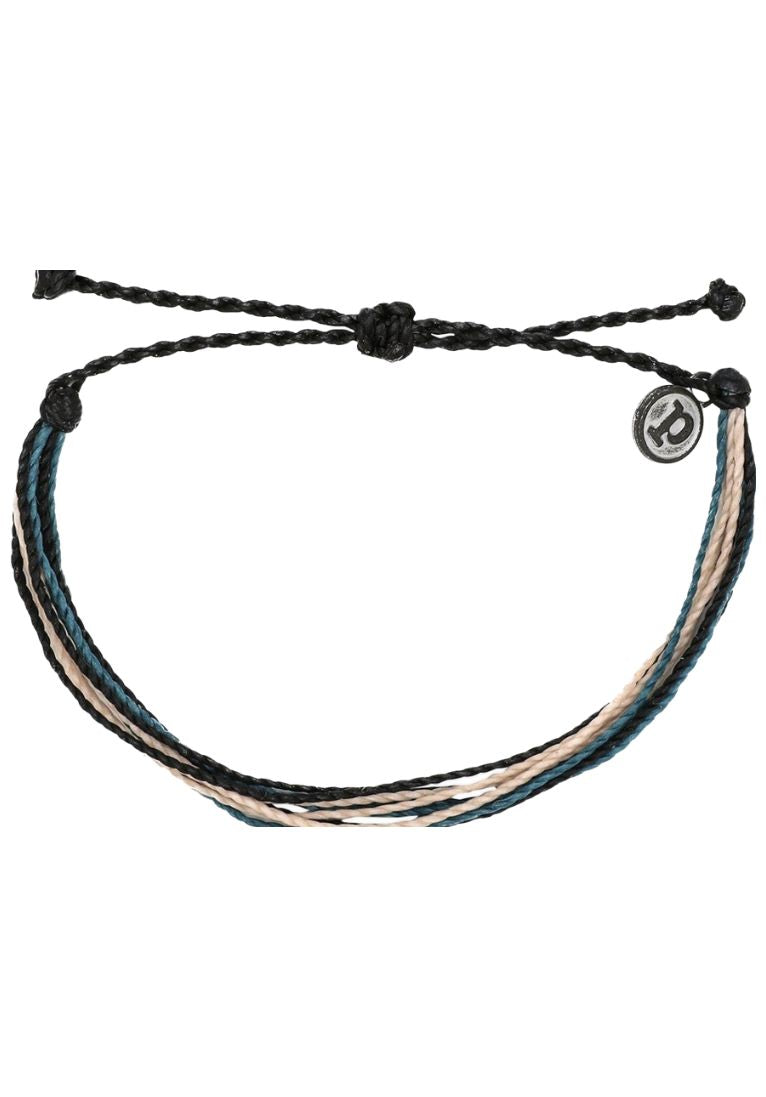 Pura Vida Muted Original Bracelet in Dark Seas  It’s the bracelet that started it all. Each one is handmade, waterproof and totally unique—in fact, the more you wear it, the cooler it looks. Grab yours today to feel the Pura Vida vibes.