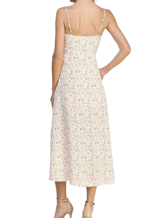 Perfectly Sweet Midi Dress  Floral midi dress - Spaghetti strap - Empire waist - Front tie detail - Midi length - Side slit - Lined  Material:  100% Polyester back