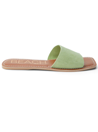 Bali Slide Sandal in Lime  Classic one-band slide sandal with squared off toe.  Details:  Suede upper. Manmade outsole. Synthetic leather lining. Padded insole. Imported. Please note: due to the nature of the leathers used on this style, each pair will look similar but not identical to the one pictured. These are considered natural variances and part of the intended look. Alternate