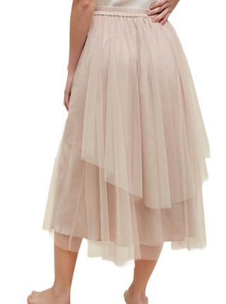Celestial Layers Tulle Skirt  Double layered tulle midi skirt with elastic waistband.  Line  Material: Self: 100% Polyester  Lining:  97% Polyester, 3% Spandex back