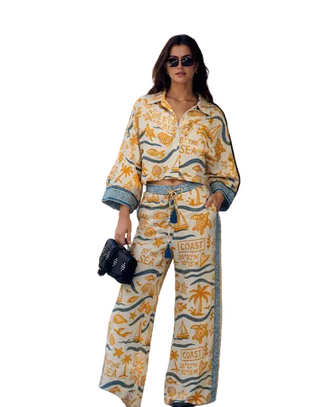 a woman wearing Z&L Europe Zaya Shirt nautical motif with matching pants