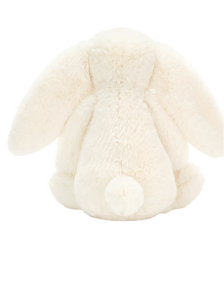 A cream-colored plush bunny toy shown from the back on a white background, with text below reading 'Bashful Cream Bunny' and a price of $33.00 USD.