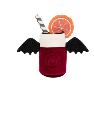 A plush drink cup toy labeled 'Amuseables Vampop Drink' on a white product page. The plush cup is deep red with a white rim, black bat wings, and a striped straw, with an orange slice garnish.