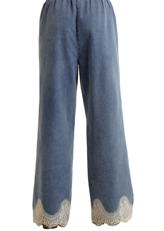 a woman wearing Lace-Trim Denim Pants