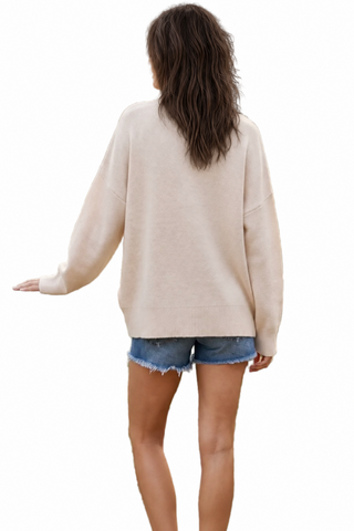 a woman wearing an oatmeal color  aFawn Sweater